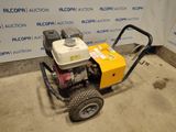 an image of a small engine on a cart in a garage