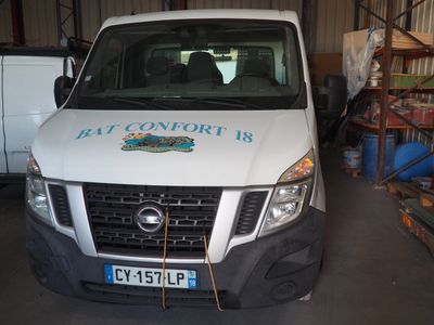 a white van that is parked in a garage