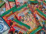 a pile of dragon ball cards on the floor