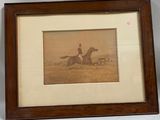a picture of a man riding a horse in a picture frame