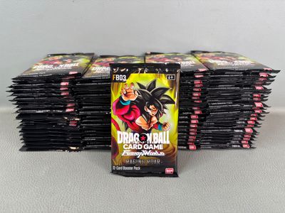 a pile of dragon ball cards sitting on top of each other