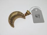a close up of a metal object with a tag on it