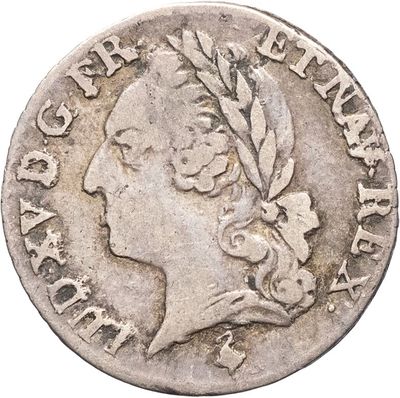 gros plan d'une pièce de monnaie sur fond blanc