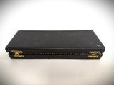 an image of a black briefcase sitting on top of a white table