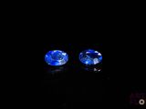 a pair of blue sapphires in the dark