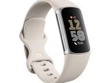L'Apple Watch est blanche et est équipée d'un capteur de fréquence cardiaque.