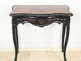 an image of a small table with a marble top