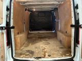 a white van that is inside of a building