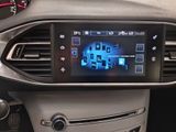 a picture of a car dashboard with a digital display