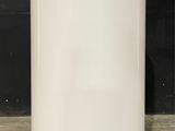 a white air purifier sitting on a counter