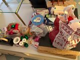 a table with many items on it in a room