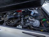 a car engine with a lot of wires and wires in it