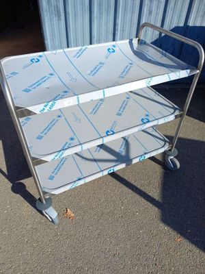 une image représentant un chariot sur lequel est posée une feuille de papier