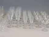 a lot of empty wine glasses sitting on a table