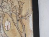 a picture of a picture of a tree with a lantern hanging from it