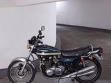 a motorcycle that is parked in a parking garage