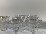 six wine glasses sitting on a table next to each other