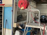 an image of a garage with a ladder and a fire hydrant