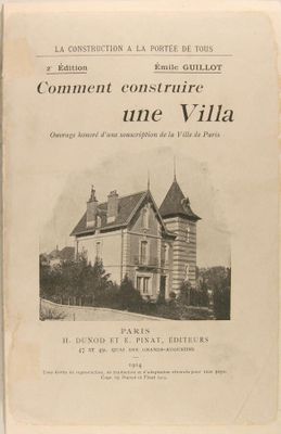 un vieux livre avec l'image d'une maison sur la couverture