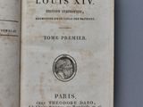 an open book with a picture of a man on it