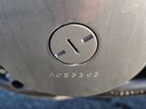 a close up view of a motorcycle with a logo on it
