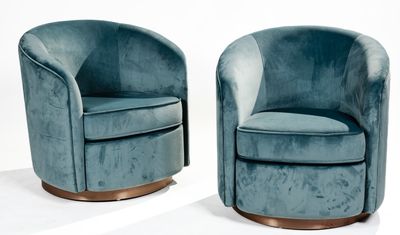 pair of mid century swivel chairs in blue velvet