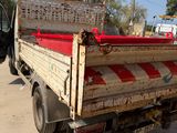a truck that is parked on the side of the road