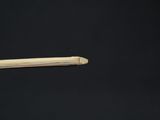 a close up of a person holding a pencil in their hand