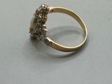 an image of a gold ring with diamonds on it