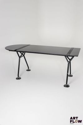 an image of a black table with two legs and a black top
