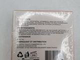 the back of a box of toothpaste sitting on a table