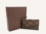 louis vuitton wallet in brown and gold with box