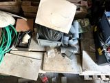 a pile of assorted items sitting on a pallet