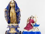an image of a statue of the virgin mary and a statue of jesus