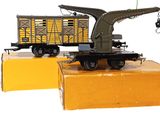 a toy train with a crane on top of it