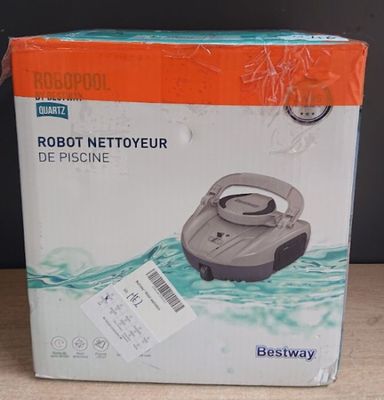 packaging for a robot nettoyeur in a box on a table