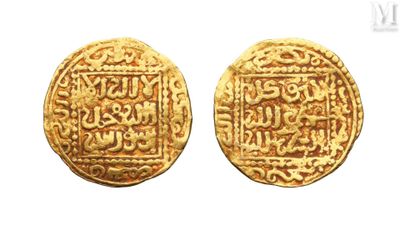 two gold coins with arabic writing on them