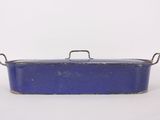 an old blue tinned casserole with a handle on a white background