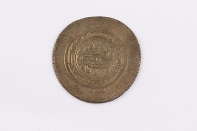an image of an old coin on a white surface