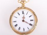 an image of a gold pocket watch with roman numerals on the face