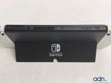 the nintendo switch is sitting on top of a white table