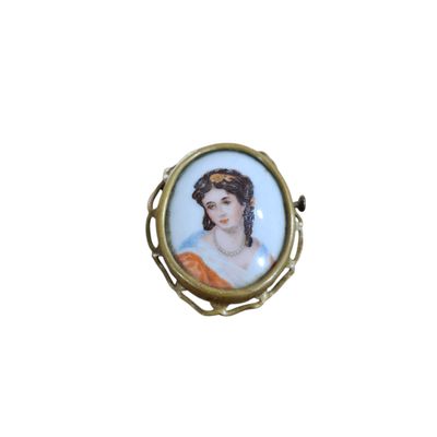 an image of a picture of a woman in a dress on a broocher