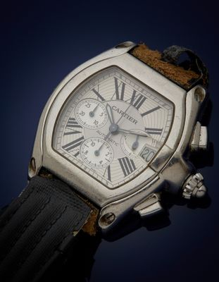 Gros plan sur une montre avec des chiffres romains