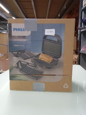 a box that has a phone and a keyboard in it