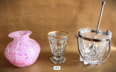 three glass vases sitting next to each other on a table