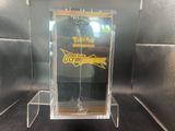 display case for a pokemon card game with a sword on it
