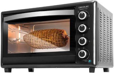 an image of a toaster oven with a ham in it
