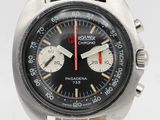 an image of a close up of a wrist watch on a white surface