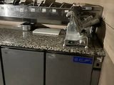 a counter with a bunch of items on it