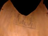 a close up of a toilet seat with the lid down